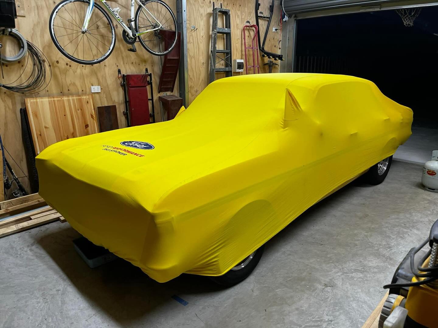 Yellow custom cover on a classic Ford Falcon