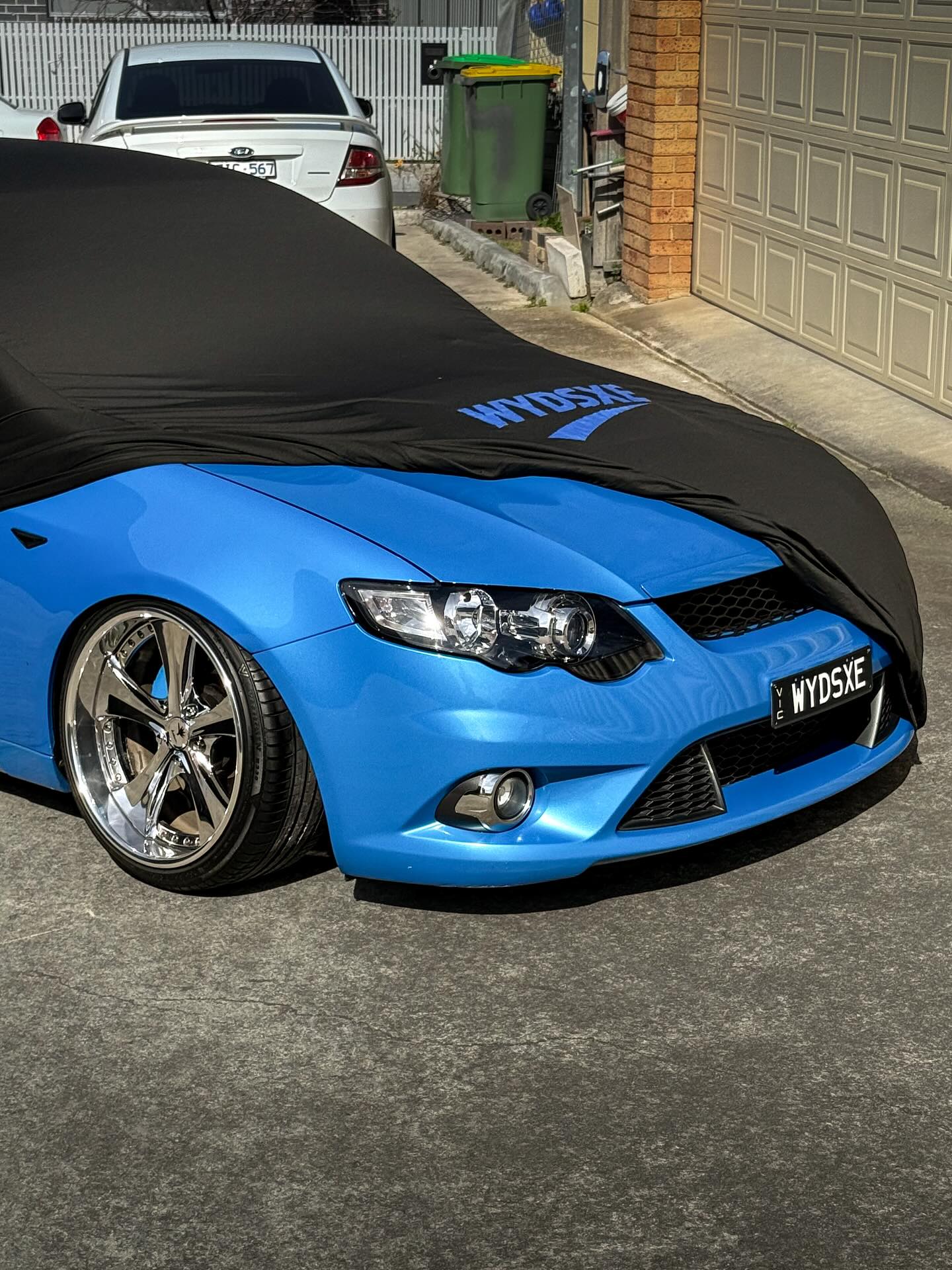 Black cover with blue logo on a blue FG Falcon