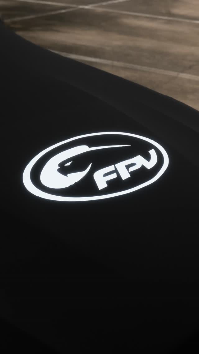 Close-up of white FPV logo printed on a black cover