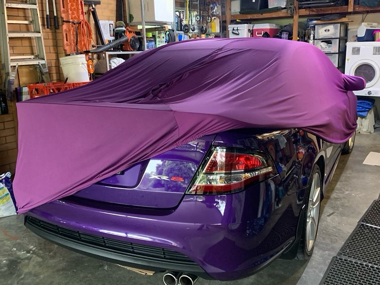 Purple cover being pulled off a purple FPV